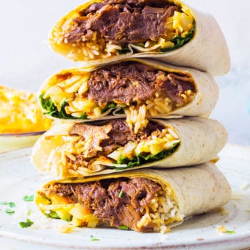 beef brisket burritos with rice and coleslaw