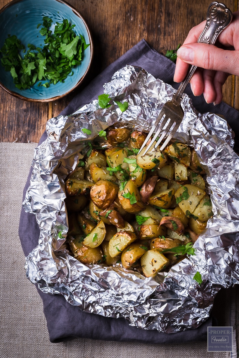 Can I cook foil packets in the oven? roast garlic butter potatoes