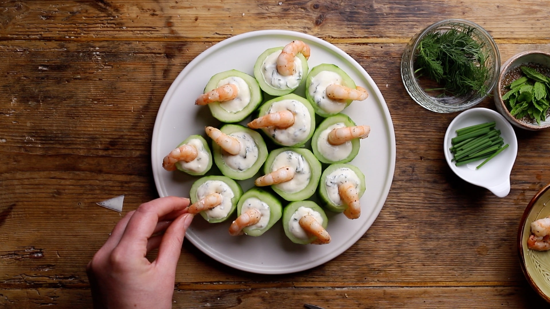 place the prawns over the lip of the cups place the prawns over the lip of the cups