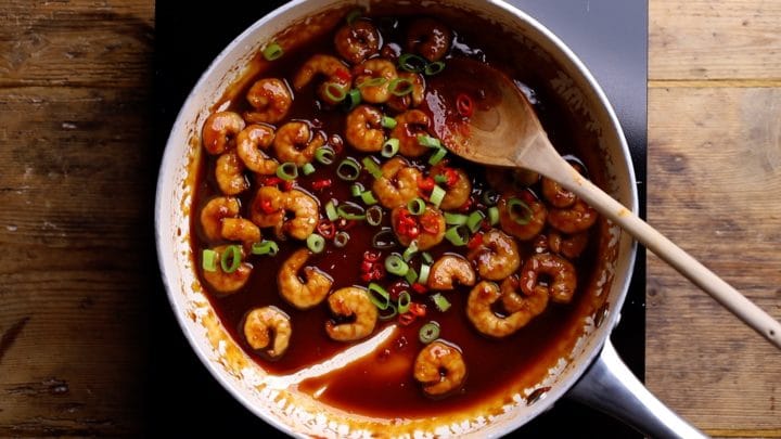 stir in spring onions and red chilli stir in spring onions and red chilli